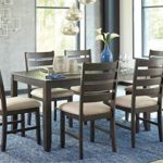 Signature Design by Ashley Rokane Dining Room Table and Chairs (Set of 7), Brown