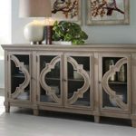 Signature Design by Ashley – Fossil Ridge 4-Door Accent Cabinet – Gray Finish – Black Metal Hardware – Quatrefoil Pattern on Glass Panel Doors